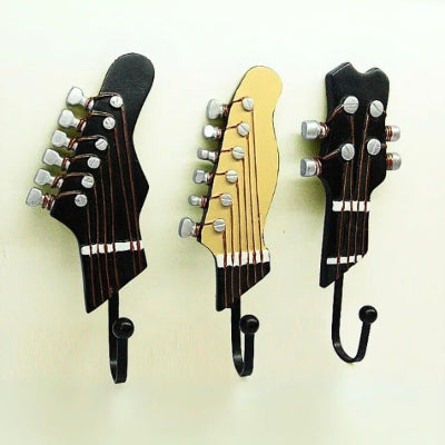 trois porte cle mural tête guitare rétro