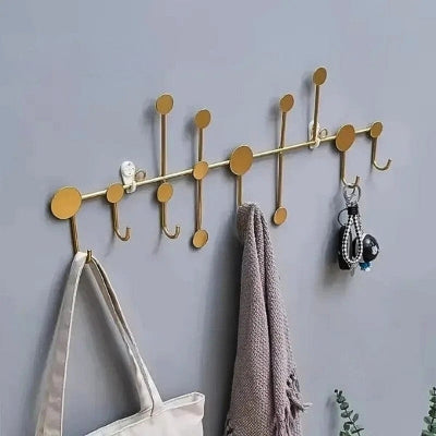 porte manteau mural doré ronds design taille grand