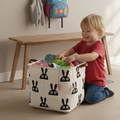 enfant souriant range chaussures panier rangement tissu lapins