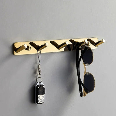 porte manteau doré cinq crochets obliques