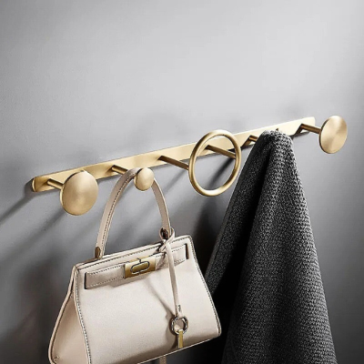 sac pendu porte manteau ronds dorés