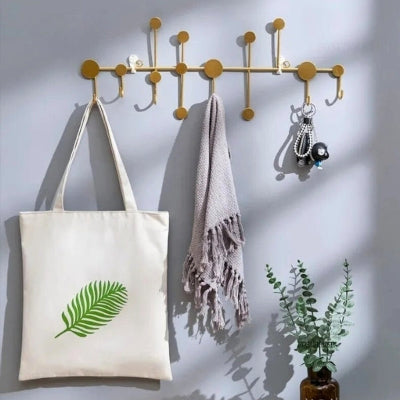 sac feuille verte suspendu porte manteau mural doré ronds original
