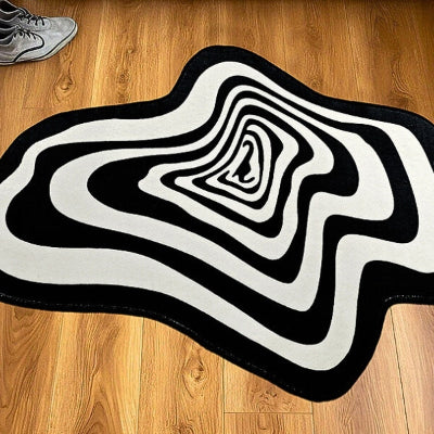 tapis d'entrée intérieur original hypnotique noir blanc sol parquet