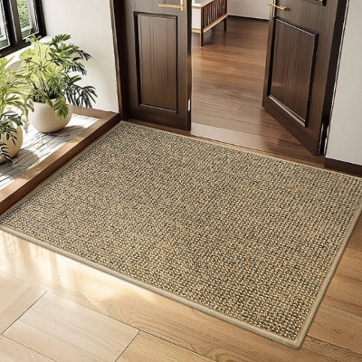 tapis d'entrée coloris miel porte marron plantes vertes