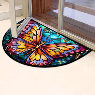 tapis entrée papillon design coloré devant porte vitrée ouverte